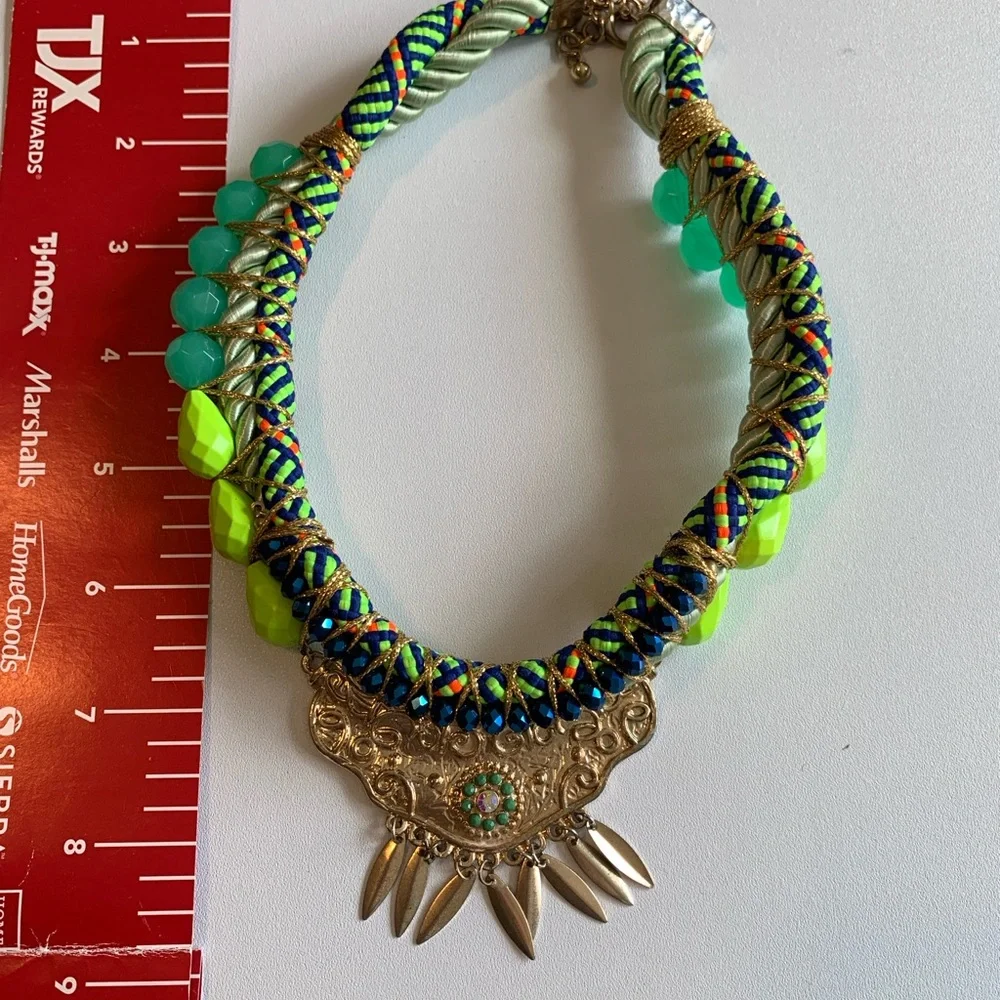 Unique hand made bib necklace in vibrant colors with mixed media.